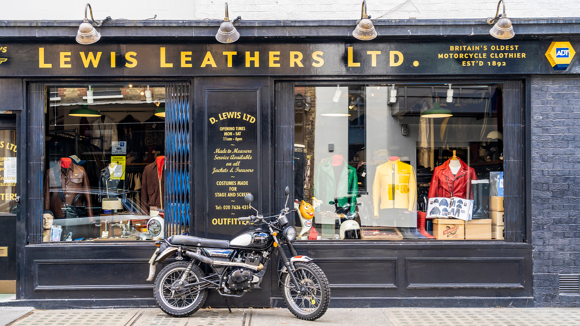The exterior of Lewis Leathers with a black motorcycle in front