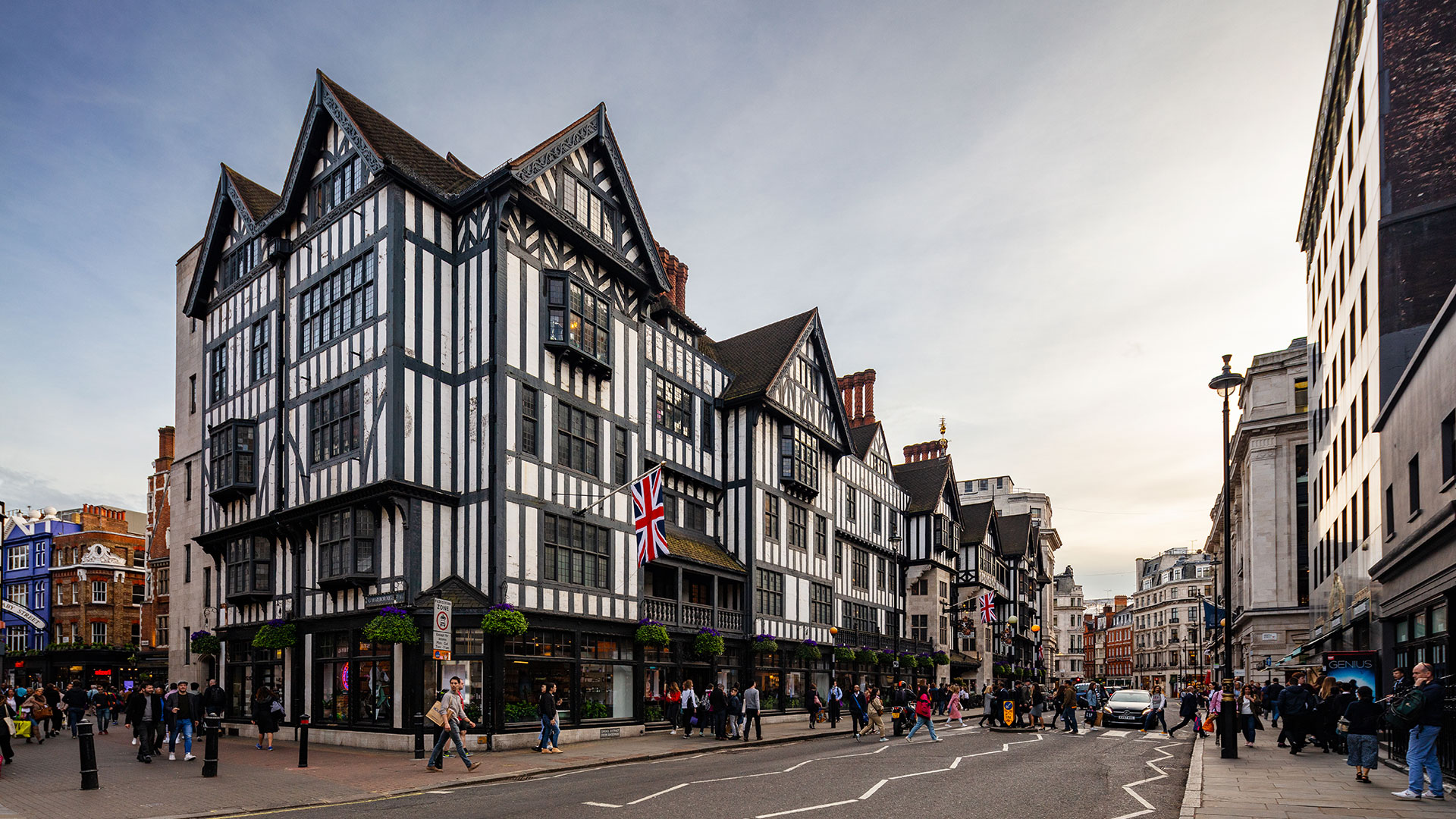 Liberty’s charming Tudor-style façade combines history with timeless elegance © visitlondon.com/Jon Reid. Image courtesy of © visitlondon.com/Jon Reid. The Tudor-style black and white exterior of Liberty London during the day from the road.
