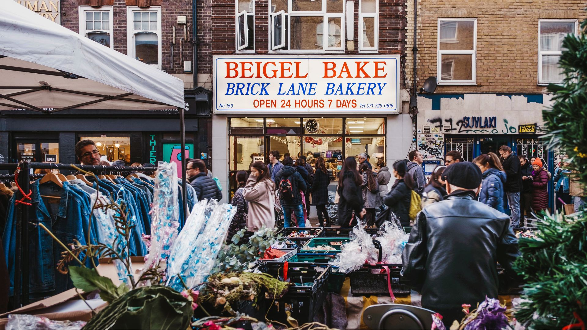Vintage clothing stalls outside of Beigel Bake on Brick Lane.