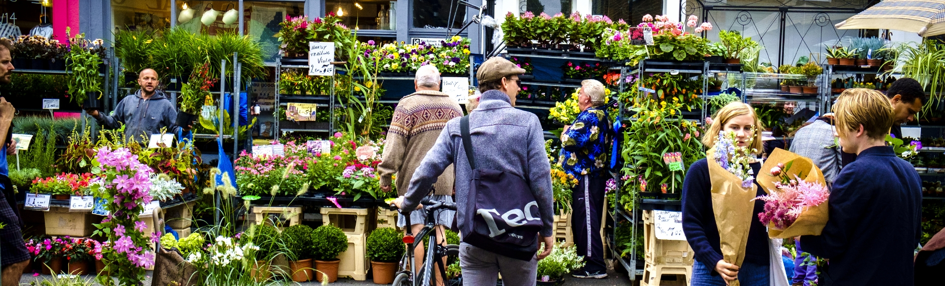People gather at Columbia Road Flower Market.