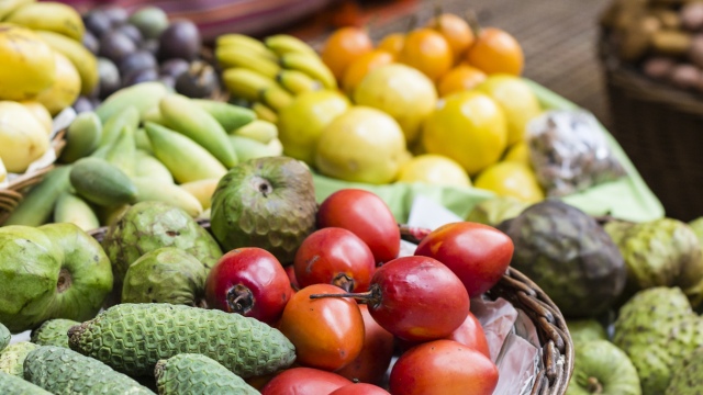 Green, red and yellow fruit and vegetable display.