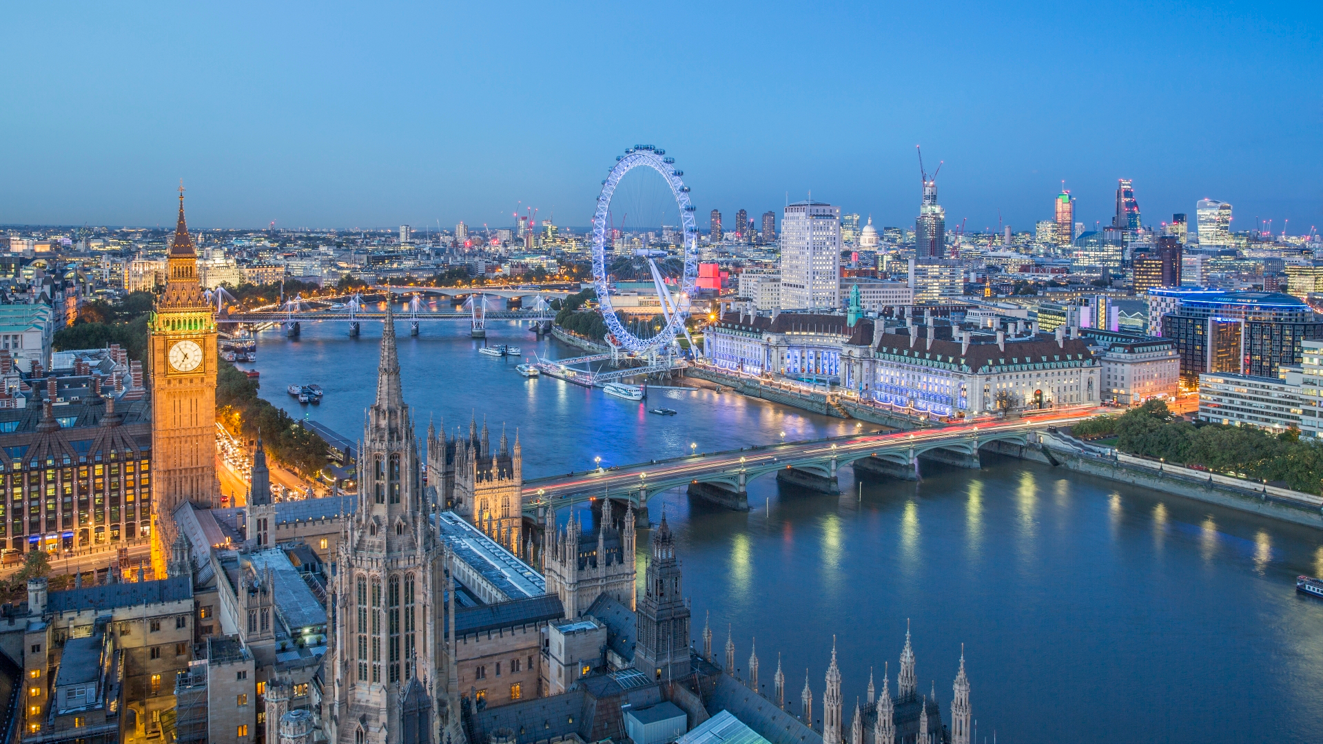 London's iconic skyline features landmarks such as Big Ben, the Houses of Parliament and the London Eye, showcasing the city's rich history and modern architecture.I mage courtesy of Julian Love / London and Partners. London skyline, river Thames, London Eye, Big Ben.