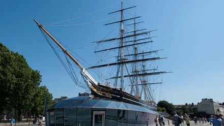 Picture yourself as the ship's captain, take the helm at the ship's wheel and marvel at the towering masts and 11 miles of rigging on the Cutty Sark. Image courtesy of Golden Tours.