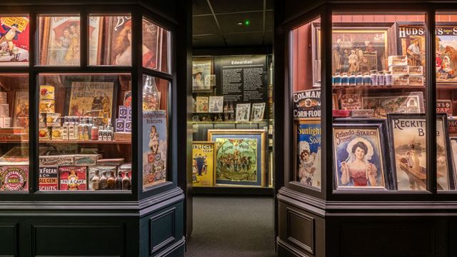 The Museum of Brands displays a wide range of magazines and other packaging under glass pannels.