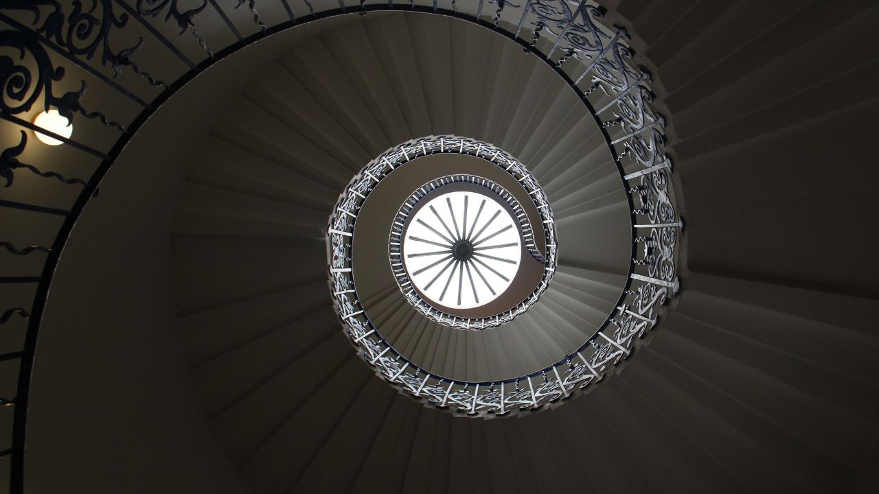 The spiral staircase in the queens house in london.