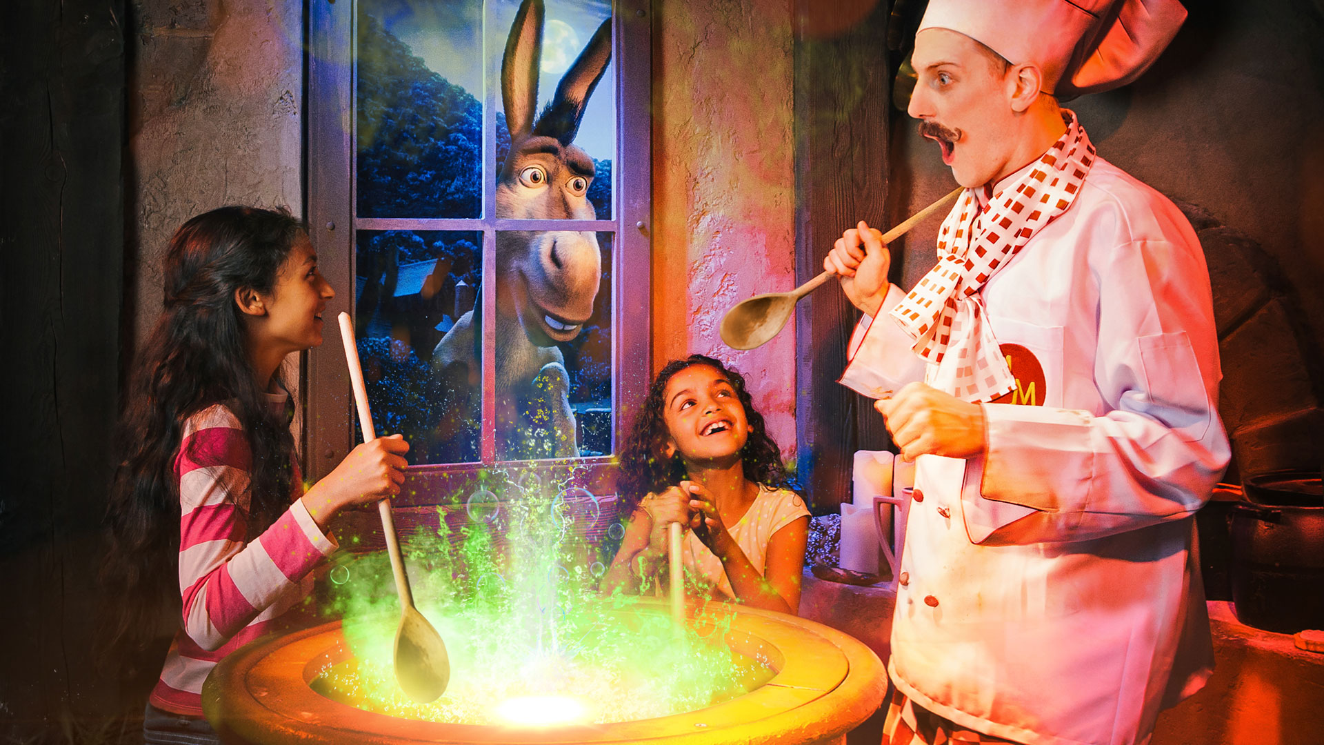 With Donkey looking on from the window, a chef cooks around a bubbling cauldron with the help of children.