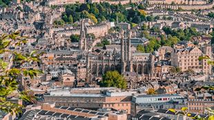 A birds eye view of the city of Bath and its beautiful architecture including the many church spires. 