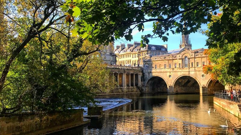 Enjoy riverside views in the enchanting city of Bath. © Unsplash/James Shaw