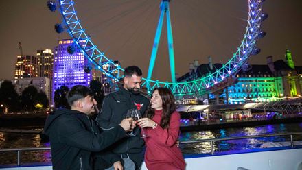 Enjoy a drink aboard a river Thames evening cruise. Image credit: City Cruises. Image courtesy of City Cruises.