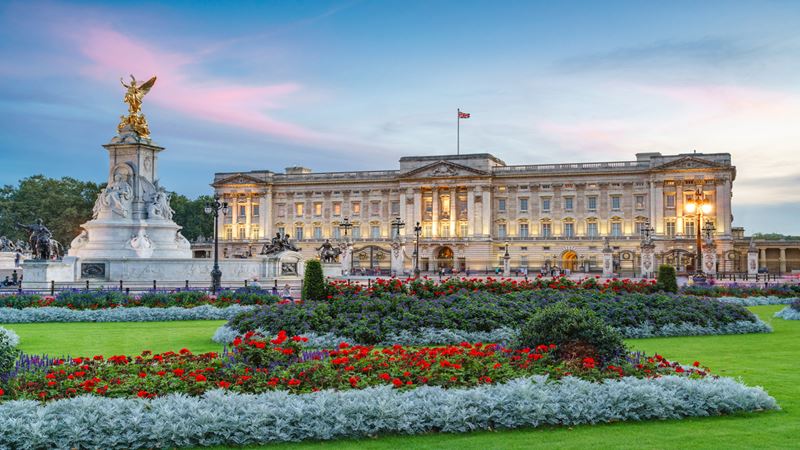 Buckingham Palace. Credit: Jon Reid. Image courtesy of visitlondon.com. Exterior of Buckingham Palace during sunset.