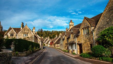 Visit the Cotswolds and explore its charming villages with their adorable matchbox cottages. Image courtesy of George Ciobra on Unsplash.