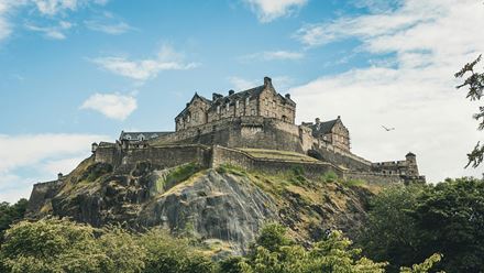 Visit Edinburgh Castle on a day trip to Edinburgh. Image credit: Jorg Angeli. Image courtesy of Unsplash.