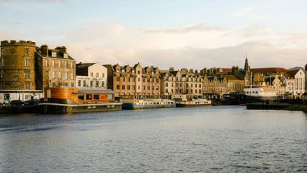 Visit the port district Leith in Edinburgh. Image courtesy of Unsplash, photo credit: Bayo Adegunloye