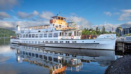 Visit picturesque villages before enjoying a scenic cruise on Lake Windermere. Image courtesy of Golden Tours.