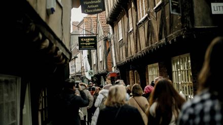 Walk the cobbled alleyways of The Shambles on a guided walking tour. © Unsplash/Skylar McKissack