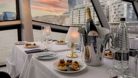 Tuck into a delicious four-course meal on a Thames dinner cruise. Image courtesy of Golden Tours. Tuck into a delicious four-course meal on a Thames dinner cruise. Image courtesy of Golden Tours.
