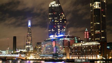 Admire the shining London skyline from the river Thames. Image courtesy of Golden Tours.