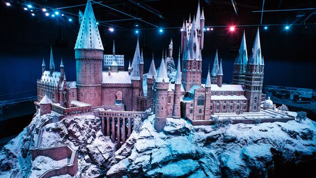 A model of Hogwarts Castle covered in snow, part of the Warner Bros. Studio Tour.
