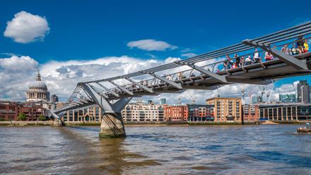 Millennium Bridge, a steel suspension bridge for pedestrians crossing the river Thames in London, linking Bankside with the City of London. Image courtesy of Shutterstock.