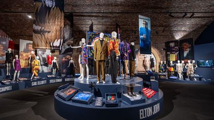 Celebrate the bold brilliance of fashion at the Gianni Versace Retrospective exhibition. See legendary looks worn by Elton John, Princess Diana and George Michael. © Justin Sutcliffe / About Grace PR