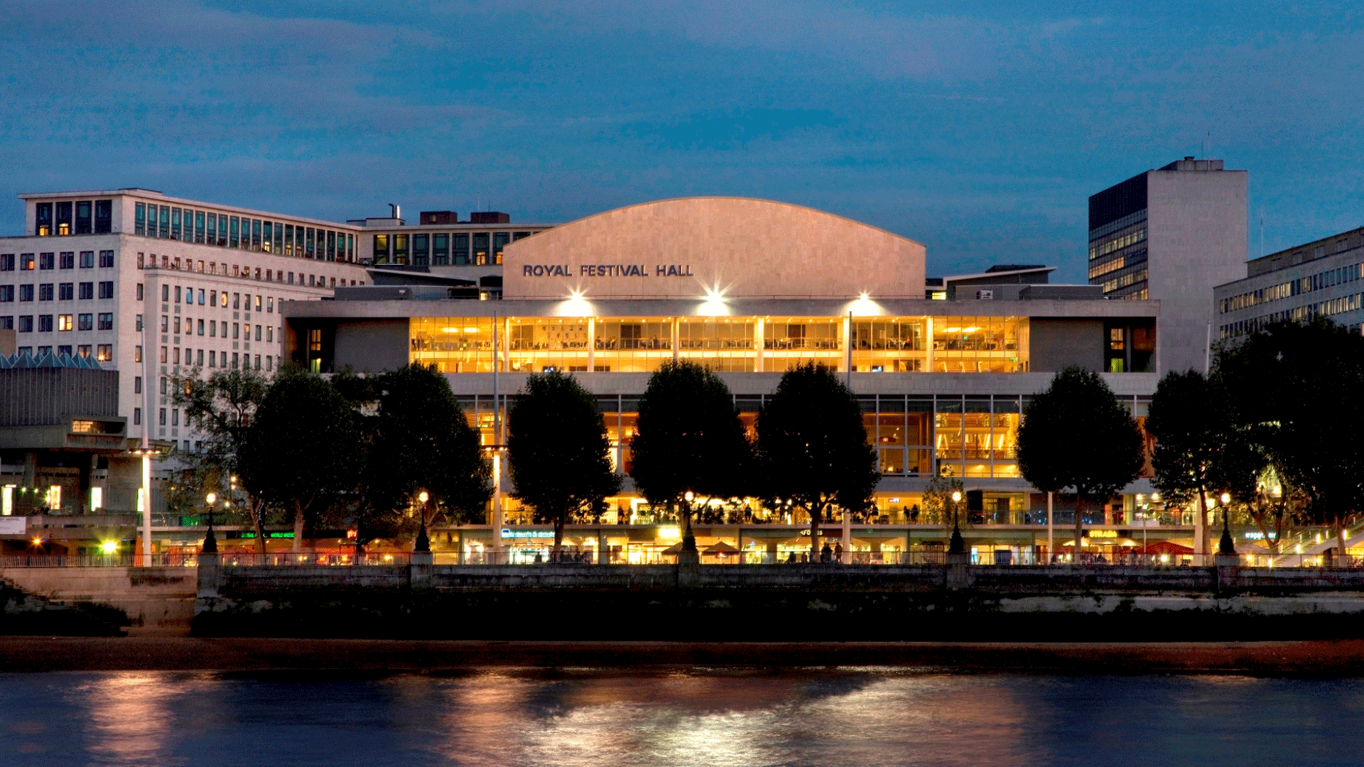 A view of Royal Festival Hall on the south bank of the Thames from the other side of the river