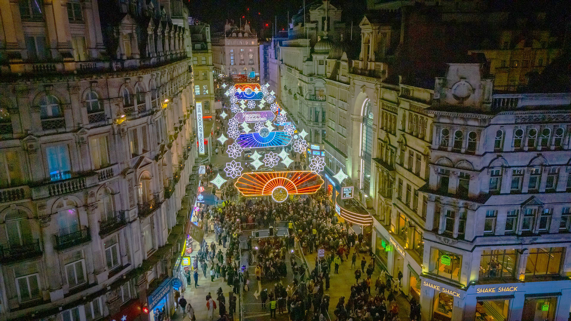 Admire the beautiful Ramadan light installation on Coventry Street in London’s West End this March. Image courtesy of: Aziz Foundation. Colourful blue and orange LED light panels hang over Coventry Street in London’s West End, celebrating the month of Ramadan.