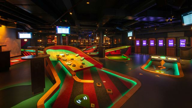 Omniously lit surrounds of Puutshack Bank's mini golf space.