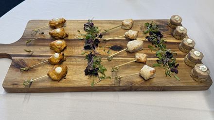 Tuck into sumptuous canapes and luxurious bowl food at the Riverside Rooms New Year's Eve party. Image courtesy of Golden Tours.