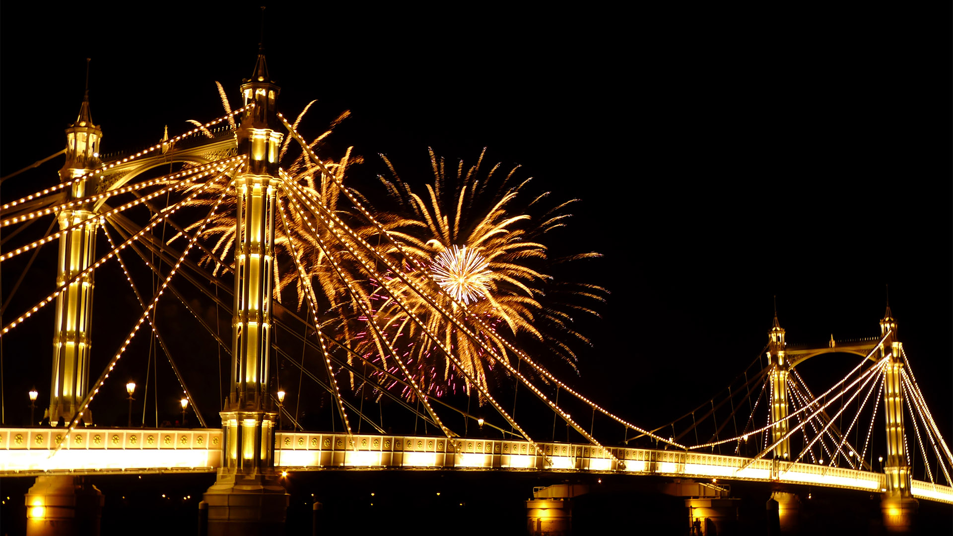 Battersea Park Fireworks seen from Albert Bridge. Image courtesy of City Cruises. Fireworks light up the sky over Chelsea Bridge on Bonfire Night.