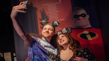 Snap fun photos with nostalgic Disney characters at Disney100: The Exhibition in London. Image courtesy of Golden Tours.