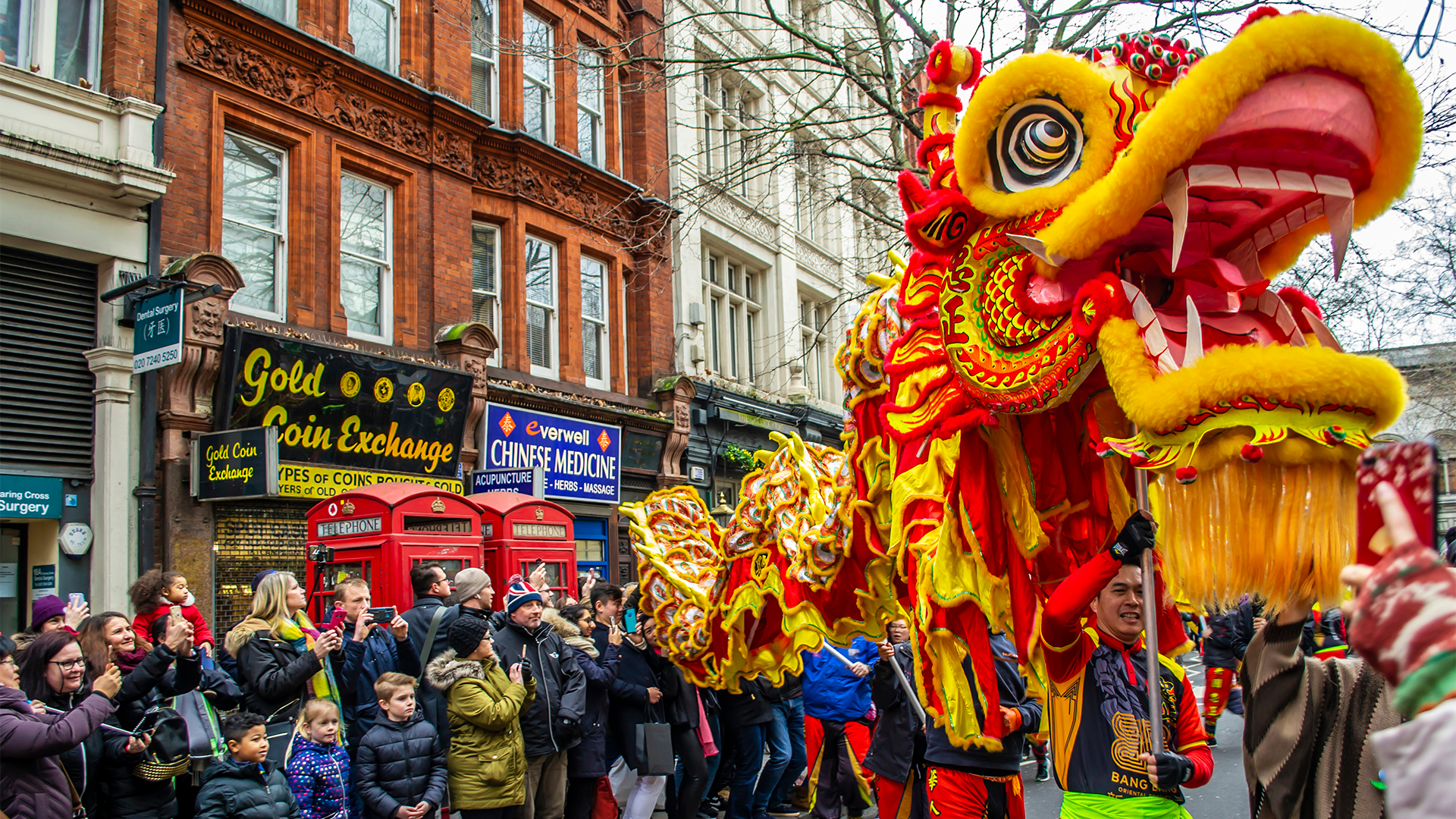 A dragon figure is paraded through the streets for Chinese New Year in London