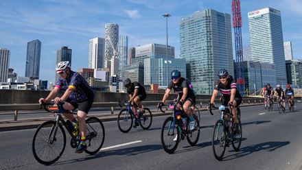 Cyclists travel through Canary Wharf. Image courtesy of London Marathon Events