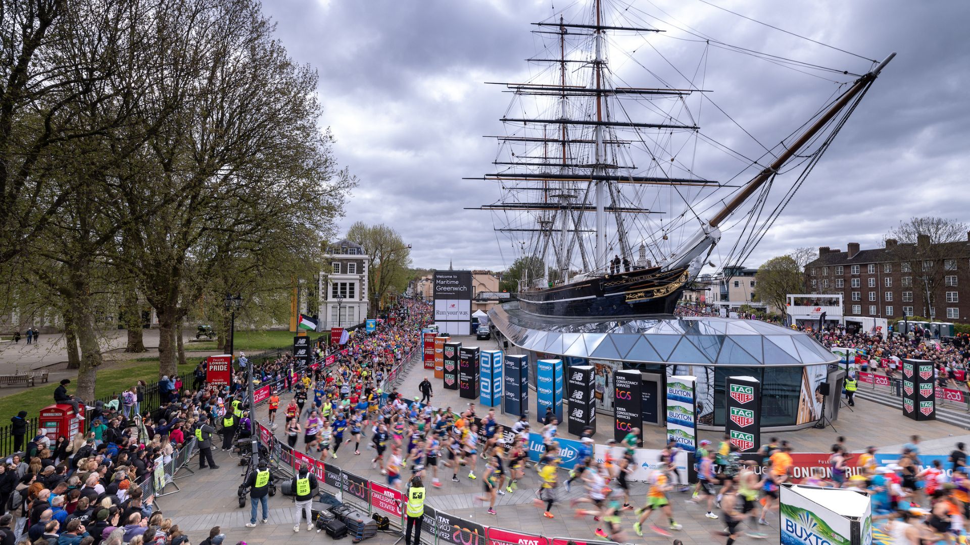 Participants in the mass event pass the Cutty Sark as they go through Greenwich during The TCS London Marathon on Sunday 21st April 2024.