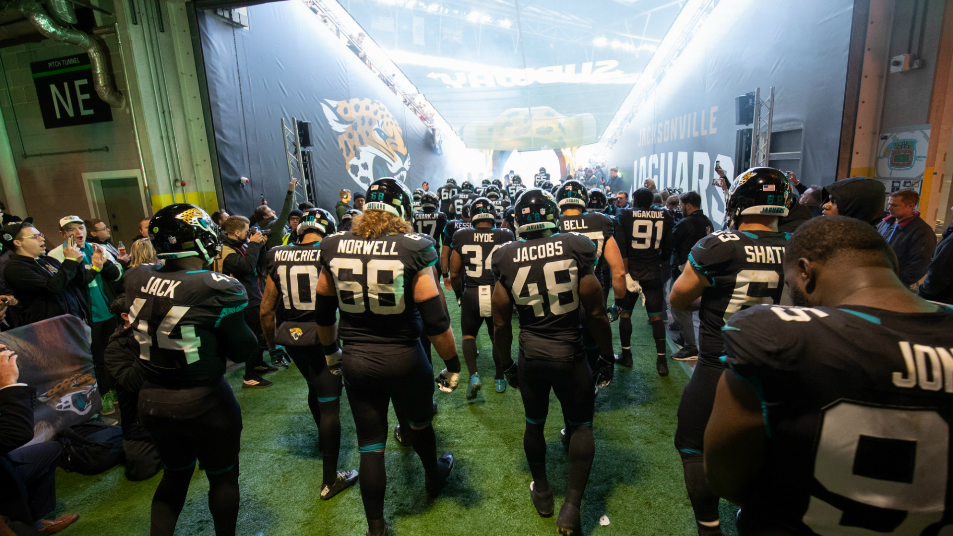 The Jacksonville Jaguars team walk through the tunnel onto the field. Image courtesy of NFL UK. 