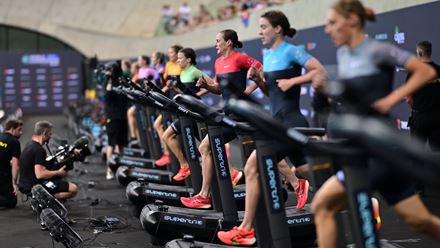 Competitors run side-by-side on treadmills. Image courtesy of Supertri