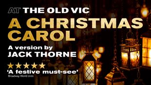 Artwork promoting A Christmas Carol, with the title written in bold gold letters over a blackdrop on illuminated lanterns.