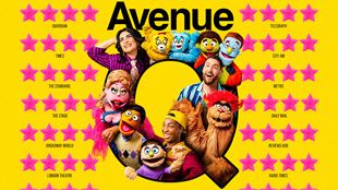 The Avenue Q show's artwork features several puppets and actors lining the large letter Q on a yellow background, with pink stars throughout to highlight the show's good reviews.