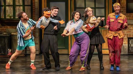 The multi-award-winning show, created by the team behind The Book of Mormon, parodies much-loved children’s puppet show Sesame Street. Credit: Matt Crockett. Image courtesy of London Theatre Direct.