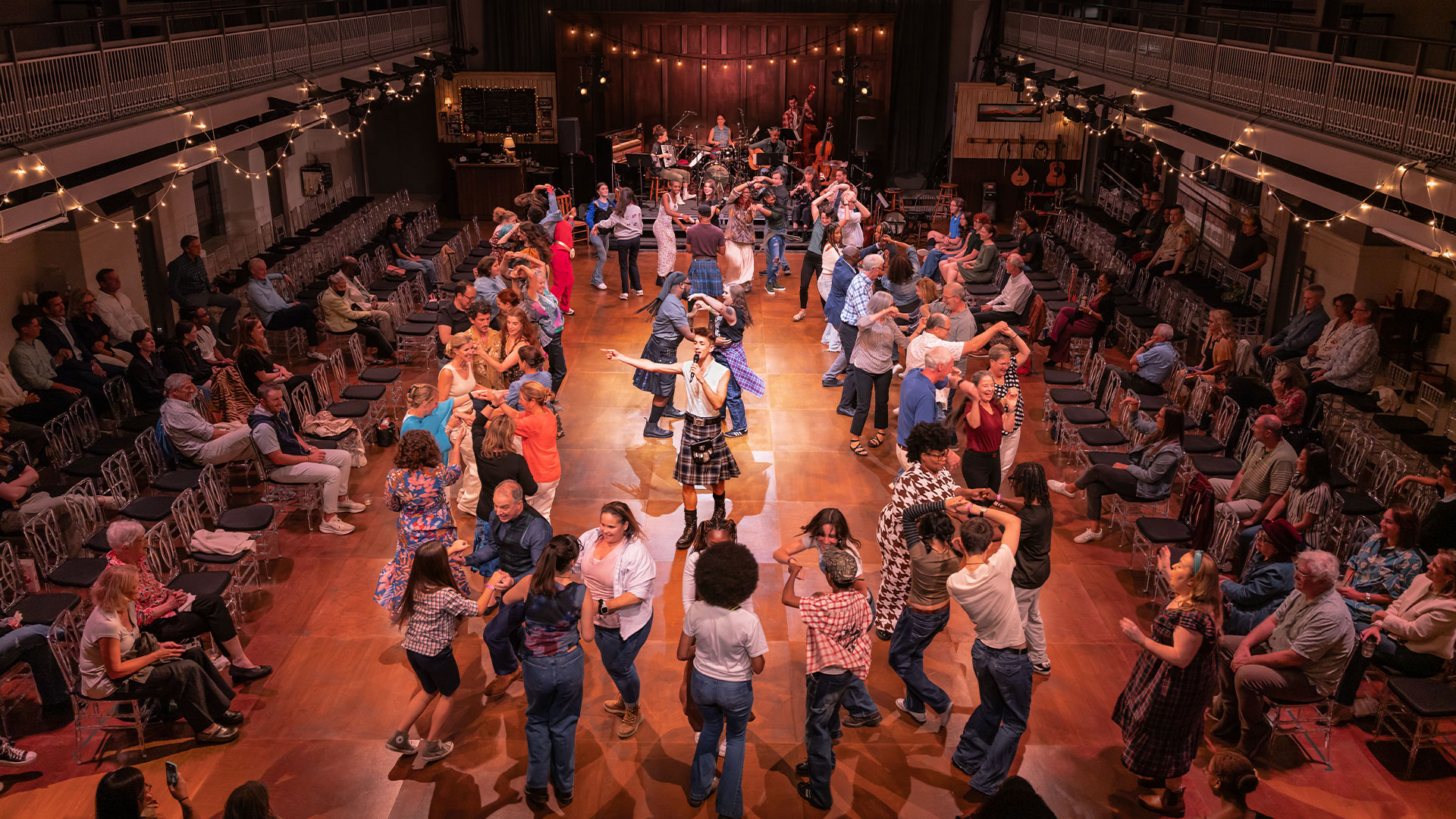 The cast of Ceilidh the Musical are joined by theatregoers for a traditional Scottish ceilidh dance.