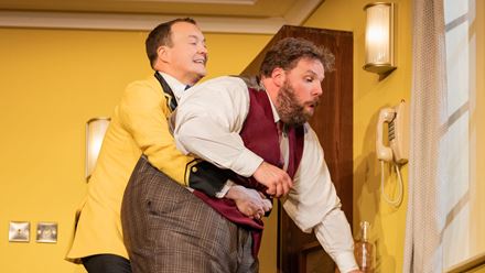 Meet hilarious hotel manager Albert Hipton and budding actor Douglas Woodbead at The Comedy About Spies. Image courtesy of London Theatre Direct.