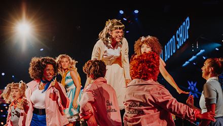 Step back into the 1950s and follow the T-Birds and the Pink Ladies to Rydell High in the new Grease Immersive Experience. Image courtesy of Storyhouse PR. Photo credit: Luke Dyson.