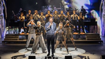 Relive the sensational concert that captured the world's attention with top rock stars in the new musical Just For One Day at the Shaftesbury Theatre. Image courtesy of London Theatre Direct