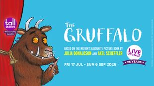 Artwork promoting the children's theatre show The Gruffalo, showing a brown buffalo behind a red curtain with the show's title in bold white letters against a light blue background.