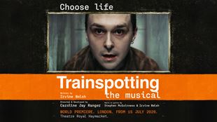 The words 'Trainspotting The Musical' are featured in bold white font over a orange banner, which is placed under an close-up portrait of a man.
