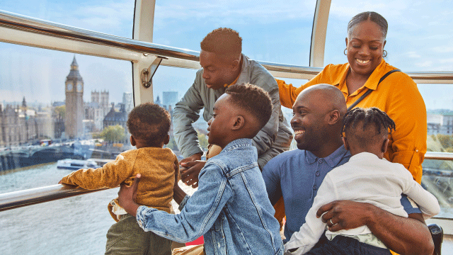 Enjoy spectacular views of the city from the London Eye. Image courtesy of Cumulus. Family enjoy a ride on the London Eye