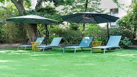  Relax in the garden at the stylish DoubleTree by Hilton London Kensington. Image courtesy of Hilton.