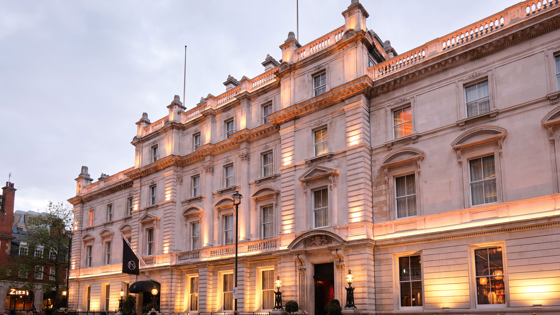 Enjoy an elegant stay at NoMad London © Cristian Barnett. Image courtesy of Hilton. The exterior of the NoMad London at dusk
