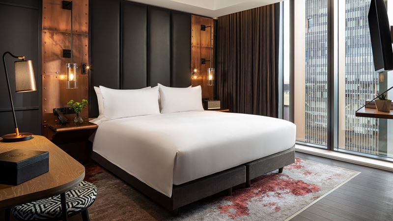 Soak up panoramic views of London from The Gantry. Credit: Hilton. Image courtesy of Hilton. Bedroom as part of a suite at The Gantry London.