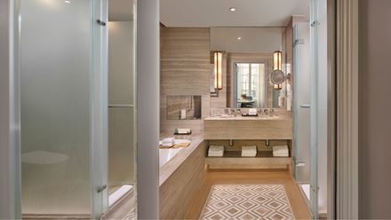 Guest bedroom ensuite at The Trafalgar St. James London. Image courtesy of Hilton.