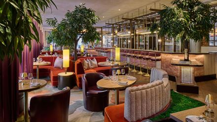 Bar and dining room at The Trafalgar St. James London. Image courtesy of Hilton.